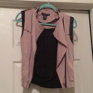 Black leather and tan vest